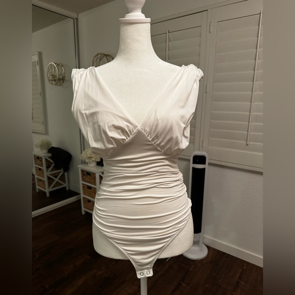 Express- draped bodysuit